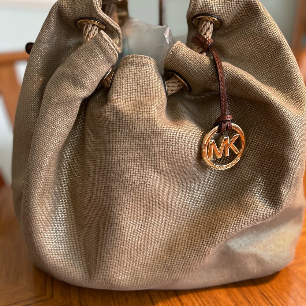 Michael Kors Metallic Gold Drawstring Hobo with MK Charm